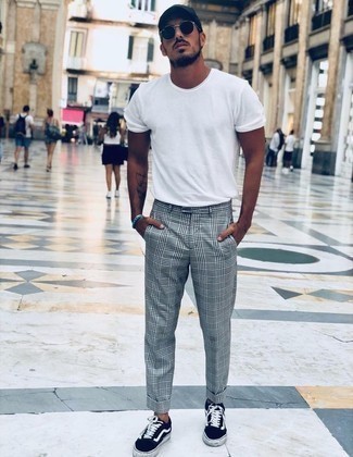 Blue Canvas Low Top Sneakers Outfits For Men: Go for a white crew-neck t-shirt and grey plaid chinos for a no-nonsense look that's also well put together. Blue canvas low top sneakers are a wonderful choice to round off your look.