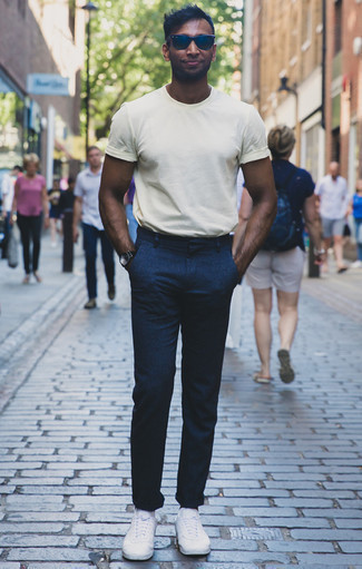 White Socks Hot Weather Outfits For Men: This combination of a white crew-neck t-shirt and white socks spells versatility and stylish comfort. Finish off with a pair of white canvas low top sneakers to make the ensemble a bit sleeker.