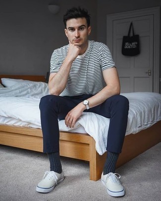 White Crew-neck T-shirt with Navy Chinos Casual Outfits: Go for a white crew-neck t-shirt and navy chinos to feel instantly confident in yourself and look casual and cool. Introduce a pair of beige canvas low top sneakers to the mix and you're all set looking amazing.