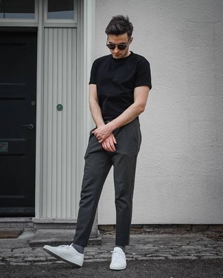 Black Crew-neck T-shirt with Low Top Sneakers Outfits For Men: This combo of a black crew-neck t-shirt and charcoal chinos is on the casual side yet it's also on-trend and incredibly stylish. Let your outfit coordination skills truly shine by rounding off this outfit with a pair of low top sneakers.