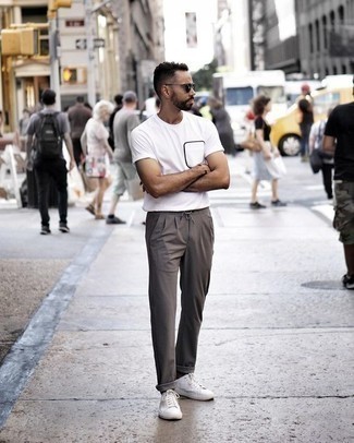 White Crew-neck T-shirt Hot Weather Outfits For Men: If you enjoy the comfort look, consider wearing a white crew-neck t-shirt and grey chinos. Complete this outfit with a pair of white canvas low top sneakers et voila, your look is complete.