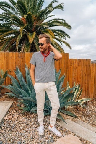 Red Bandana Outfits For Men: Try teaming a white and navy horizontal striped crew-neck t-shirt with a red bandana to pull together an interesting and urban outfit. To add a bit of classiness to this getup, add a pair of white canvas low top sneakers to the mix.