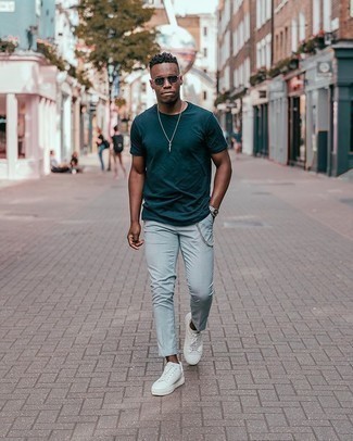 Navy Sunglasses Outfits For Men: If the situation allows casual city style, go for a teal crew-neck t-shirt and navy sunglasses. For a more sophisticated twist, why not introduce white canvas low top sneakers to this getup?