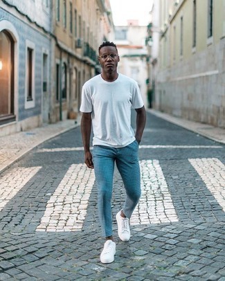 Light Blue Chinos Outfits: Exhibit your credentials in men's fashion by combining a white crew-neck t-shirt and light blue chinos for a relaxed combo. Our favorite of a myriad of ways to round off this outfit is with a pair of white canvas low top sneakers.
