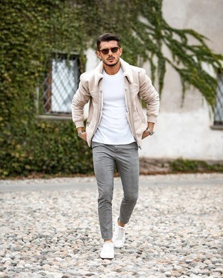 Charcoal Plaid Chinos Hot Weather Outfits: For a casual outfit with a modern twist, dress in a white crew-neck t-shirt and charcoal plaid chinos. Introduce a pair of white canvas low top sneakers to the mix and you're all done and looking awesome.