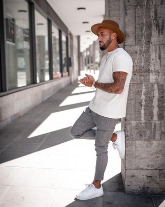 Brown Wool Hat Outfits For Men: A white crew-neck t-shirt and a brown wool hat are great menswear items to add to your casual styling rotation. To give your overall outfit a more refined spin, introduce white canvas low top sneakers to the mix.