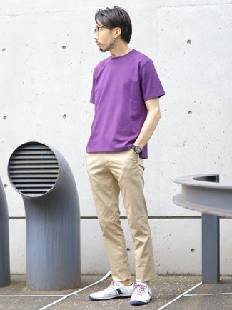 White and Navy Canvas Low Top Sneakers Outfits For Men: This combination of a violet crew-neck t-shirt and beige chinos is great for most casual occasions. Complement your look with a pair of white and navy canvas low top sneakers et voila, this outfit is complete.