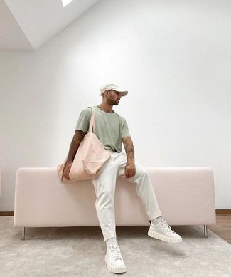 Mint Crew-neck T-shirt Outfits For Men: This combo of a mint crew-neck t-shirt and white chinos is perfect for weekend days. If you're wondering how to finish off, a pair of white canvas low top sneakers is a smart choice.