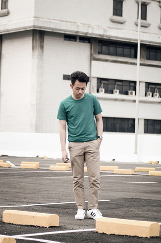 Men's Dark Green Crew-neck T-shirt, Khaki Chinos, White and Navy Canvas Low Top Sneakers, Black Leather Watch