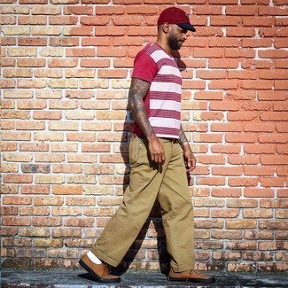Burgundy Print Baseball Cap Outfits For Men: A red and white horizontal striped crew-neck t-shirt and a burgundy print baseball cap are a savvy pairing worth incorporating into your current off-duty lineup. Give a different twist to your outfit by rounding off with a pair of brown canvas low top sneakers.