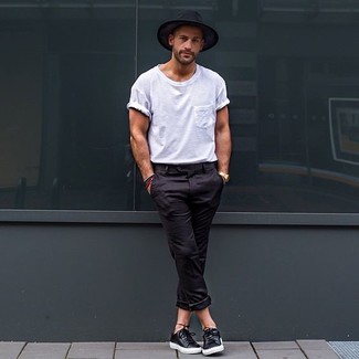 Black Hat Outfits For Men: For a casual ensemble with an urban spin, go for a white crew-neck t-shirt and a black hat. Black leather plimsolls can easily lift up any outfit.