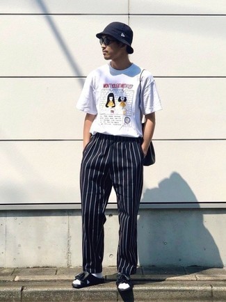 Blue Vertical Striped Chinos Outfits: Make a white print crew-neck t-shirt and blue vertical striped chinos your outfit choice if you seek to look casually cool without trying too hard. Introduce a more casual spin to by wearing black leather sandals.