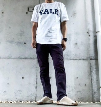 White and Navy Crew-neck T-shirt Outfits For Men: Stand out from the crowd in a white and navy crew-neck t-shirt and navy chinos. You know how to add a more relaxed aesthetic to this outfit: beige suede sandals.