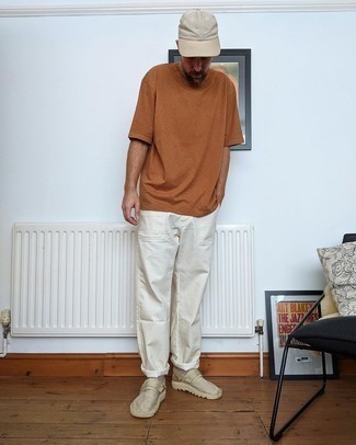 Tobacco Crew-neck T-shirt Outfits For Men: Who said you can't make a fashionable statement with a relaxed casual getup? Draw the attention in a tobacco crew-neck t-shirt and white chinos. A pair of beige canvas slip-on sneakers integrates wonderfully within a great deal of getups.