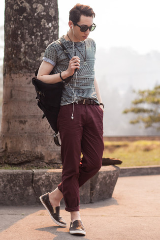 Men's White and Black Geometric Crew-neck T-shirt, Burgundy Chinos, Dark Brown Leather Slip-on Sneakers, Black Canvas Backpack