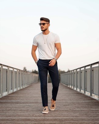 987+ Smart Casual Hot Weather Outfits For Men: A white crew-neck t-shirt and navy chinos are great menswear staples that will integrate nicely within your current off-duty routine. And if you want to instantly rev up your ensemble with shoes, why not introduce tan suede tassel loafers to the equation?