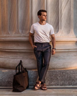 Tobacco Canvas Tote Bag Outfits For Men: Marry a white crew-neck t-shirt with a tobacco canvas tote bag to get a laid-back and absolutely dapper outfit.