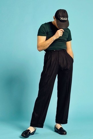 Dark Green Crew-neck T-shirt Outfits For Men: Pairing a dark green crew-neck t-shirt and black dress pants is a fail-safe way to breathe personality into your wardrobe. A pair of black leather tassel loafers instantly levels up the ensemble.