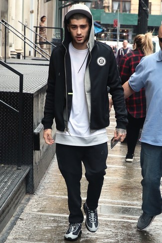 Zayn Malik wearing Black Sweatpants, White Crew-neck T-shirt, Grey Hoodie, Black Bomber Jacket