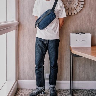 Navy Canvas Fanny Pack Outfits For Men: Master the effortlessly dapper look in a white crew-neck t-shirt and a navy canvas fanny pack. Dial down the casualness of this ensemble by rocking a pair of black and white athletic shoes.