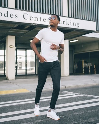 Charcoal Jeans Outfits For Men: Extremely stylish, this casual pairing of a white crew-neck t-shirt and charcoal jeans will provide you with amazing styling possibilities. For something more on the daring side to complete this outfit, complete your getup with a pair of white athletic shoes.