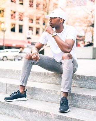 Grey Ripped Jeans Outfits For Men: A white crew-neck t-shirt and grey ripped jeans are the kind of a no-brainer casual look that you need when you have no time to spare. For extra fashion points, introduce navy and white athletic shoes to the mix.