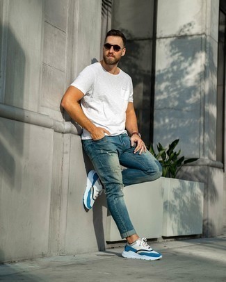 White and Blue Athletic Shoes Outfits For Men: For comfort dressing with an urban spin, you can easily dress in a white crew-neck t-shirt and blue ripped jeans. White and blue athletic shoes integrate wonderfully within a myriad of combos.