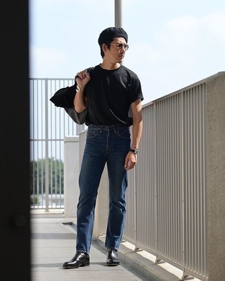 Charcoal Canvas Tote Bag Outfits For Men: The combination of a black crew-neck t-shirt and a charcoal canvas tote bag makes this a kick-ass casual getup. Let's make a bit more effort now and complement this outfit with black leather chelsea boots.