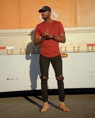 Dark Brown Print Baseball Cap Outfits For Men: This street style combination of an orange crew-neck t-shirt and a dark brown print baseball cap can take on different forms depending on the way it's styled. Add tan suede chelsea boots to this look to kick things up to the next level.