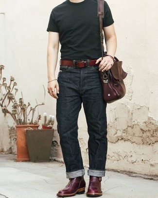 Burgundy Leather Chelsea Boots Outfits For Men: You'll be surprised at how extremely easy it is for any gentleman to pull together this relaxed outfit. Just a black crew-neck t-shirt and charcoal jeans. Why not take a classic approach with shoes and complete your outfit with a pair of burgundy leather chelsea boots?