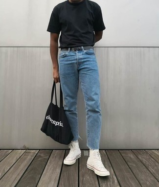 Black Canvas Tote Bag Outfits For Men: For a casual and cool outfit, go for a black crew-neck t-shirt and a black canvas tote bag — these items go perfectly together. To add a little flair to this getup, introduce white canvas high top sneakers to the equation.