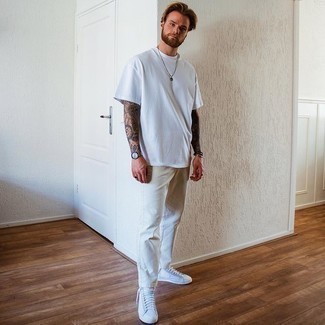White Sneakers with Beige Jeans Casual Summer Outfits For Men: If you'd like take your casual game to a new height, try teaming a white crew-neck t-shirt with beige jeans. Feeling experimental? Change things up a bit by wearing white sneakers. This look is the definition of perfect for hot summer afternoons.
