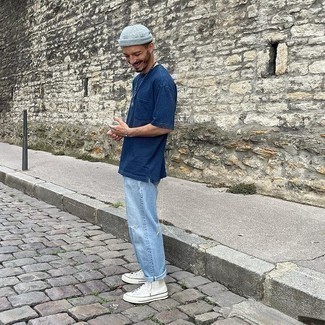 Men's Navy Crew-neck T-shirt, Light Blue Ripped Jeans, White Canvas High Top Sneakers, Grey Beanie