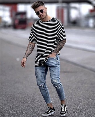 Light Blue Jeans Summer Outfits For Men In Their 20s: A white and black horizontal striped crew-neck t-shirt and light blue jeans are the kind of a never-failing casual ensemble that you so desperately need when you have no extra time to dress up. A pair of black and white canvas low top sneakers is a smart pick to finish off this look. This combo is a tested option if you're after a great, summer-ready combo. Perfect if you're hunting for some incredibly inspiring 20-something relaxed style.