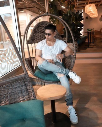Men's White Crew-neck T-shirt, Grey Ripped Jeans, White and Navy Leather Low Top Sneakers, Dark Brown Sunglasses