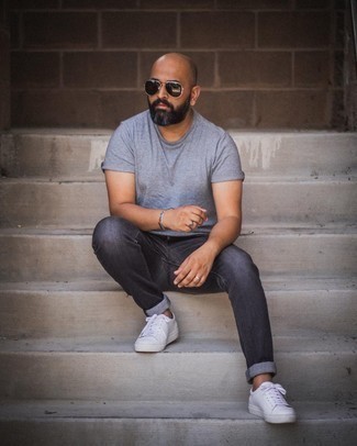 Black Sunglasses Outfits For Men: A grey crew-neck t-shirt and black sunglasses are the perfect foundation for a neat and relaxed getup. A good pair of white leather low top sneakers is a simple way to inject an added dose of style into your look.
