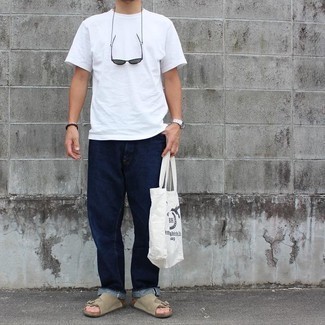 White and Black Print Canvas Tote Bag Outfits For Men: For a look that offers functionality and dapperness, opt for a white crew-neck t-shirt and a white and black print canvas tote bag. Want to break out of the mold? Then why not introduce beige suede sandals to the equation?