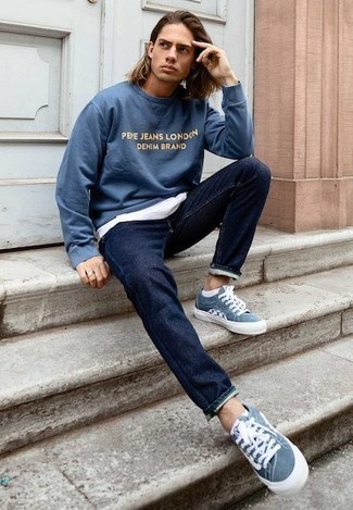 Navy Long Sleeve T-Shirt Outfits For Men: Wear a navy long sleeve t-shirt with navy jeans if you're looking for an outfit option that speaks laid-back cool. Now all you need is a nice pair of blue canvas low top sneakers to finish off your look.