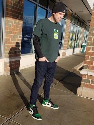 Olive Print Crew-neck T-shirt Outfits For Men: To achieve a casual look with a modern finish, make an olive print crew-neck t-shirt and navy jeans your outfit choice. Complete your look with a pair of green print leather high top sneakers for maximum impact.