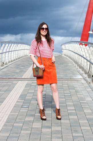 Orange Suede Pencil Skirt Outfits: Inject variation into your current casual collection with a red houndstooth crew-neck t-shirt and an orange suede pencil skirt. You can get a bit experimental on the shoe front and opt for a pair of brown suede lace-up ankle boots.