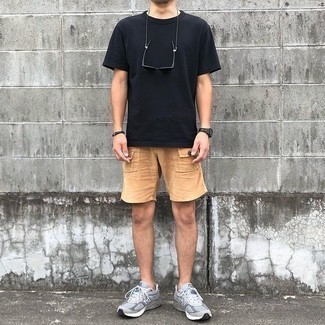 Tan Shorts Outfits For Men: If you'd like take your off-duty fashion game to a new level, reach for a black crew-neck t-shirt and tan shorts. Grey athletic shoes are a simple way to upgrade your getup.