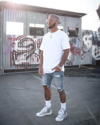 Charcoal Ripped Denim Shorts Outfits For Men: A white crew-neck t-shirt and charcoal ripped denim shorts are great menswear elements to add to your current repertoire. Let your styling chops really shine by rounding off your outfit with grey print canvas high top sneakers.