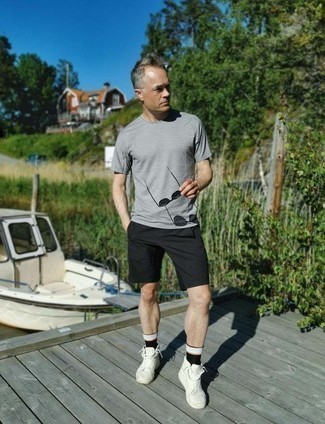 Black Socks Hot Weather Outfits For Men: Make a grey crew-neck t-shirt and black socks your outfit choice to create an interesting and casual ensemble. Spice up this ensemble by slipping into white canvas high top sneakers.