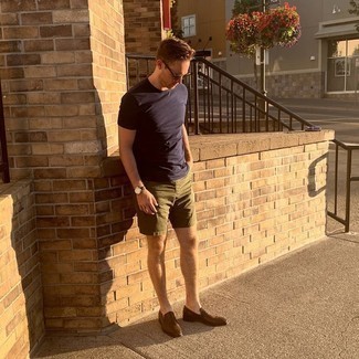 1200+ Casual Hot Weather Outfits For Men: This relaxed casual combo of a navy crew-neck t-shirt and olive shorts takes on different moods depending on the way you style it out. Finishing with a pair of dark brown woven leather loafers is a surefire way to add a bit of zing to your outfit.