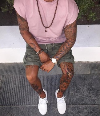 Hot Pink Crew-neck T-shirt Outfits For Men: If it's ease and practicality that you're seeking in menswear, go for a hot pink crew-neck t-shirt and olive shorts. Introduce a pair of white low top sneakers to the equation and you're all done and looking amazing.