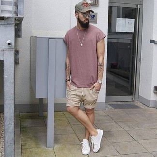 Tan Shorts Outfits For Men: This combo of a pink crew-neck t-shirt and tan shorts is hard proof that a straightforward casual look doesn't have to be boring. A pair of white canvas low top sneakers can integrate perfectly within a great deal of combos.