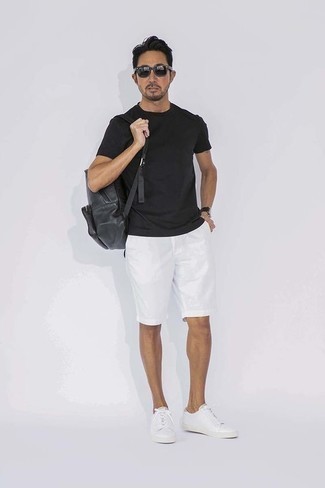 Charcoal Backpack Outfits For Men: Exhibit your expertise in menswear styling in this casual street style combination of a black crew-neck t-shirt and a charcoal backpack. To give your getup a more elegant finish, why not complement this ensemble with white leather low top sneakers?