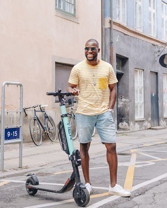 Silver Watch Hot Weather Outfits For Men: A yellow horizontal striped crew-neck t-shirt and a silver watch are an easy way to infuse effortless cool into your day-to-day routine. Balance your outfit with a sleeker kind of footwear, like these white canvas low top sneakers.