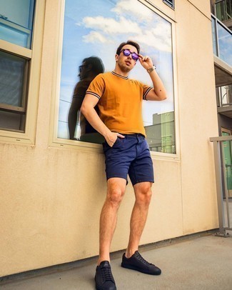 Purple Sunglasses Outfits For Men: One of the coolest ways for a man to style out an orange crew-neck t-shirt is to combine it with purple sunglasses for a relaxed combination. And if you need to immediately spruce up your look with one piece, make black leather low top sneakers your footwear choice.