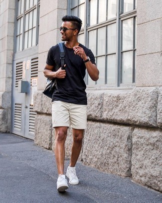 Black Crew-neck T-shirt Outfits For Men: Extremely stylish, this relaxed combination of a black crew-neck t-shirt and white shorts provides with variety. On the footwear front, this outfit pairs wonderfully with white leather low top sneakers.